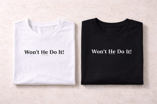 Two folded shirts, one white and one black, with text 'Won't He Do It!' on a beige background.