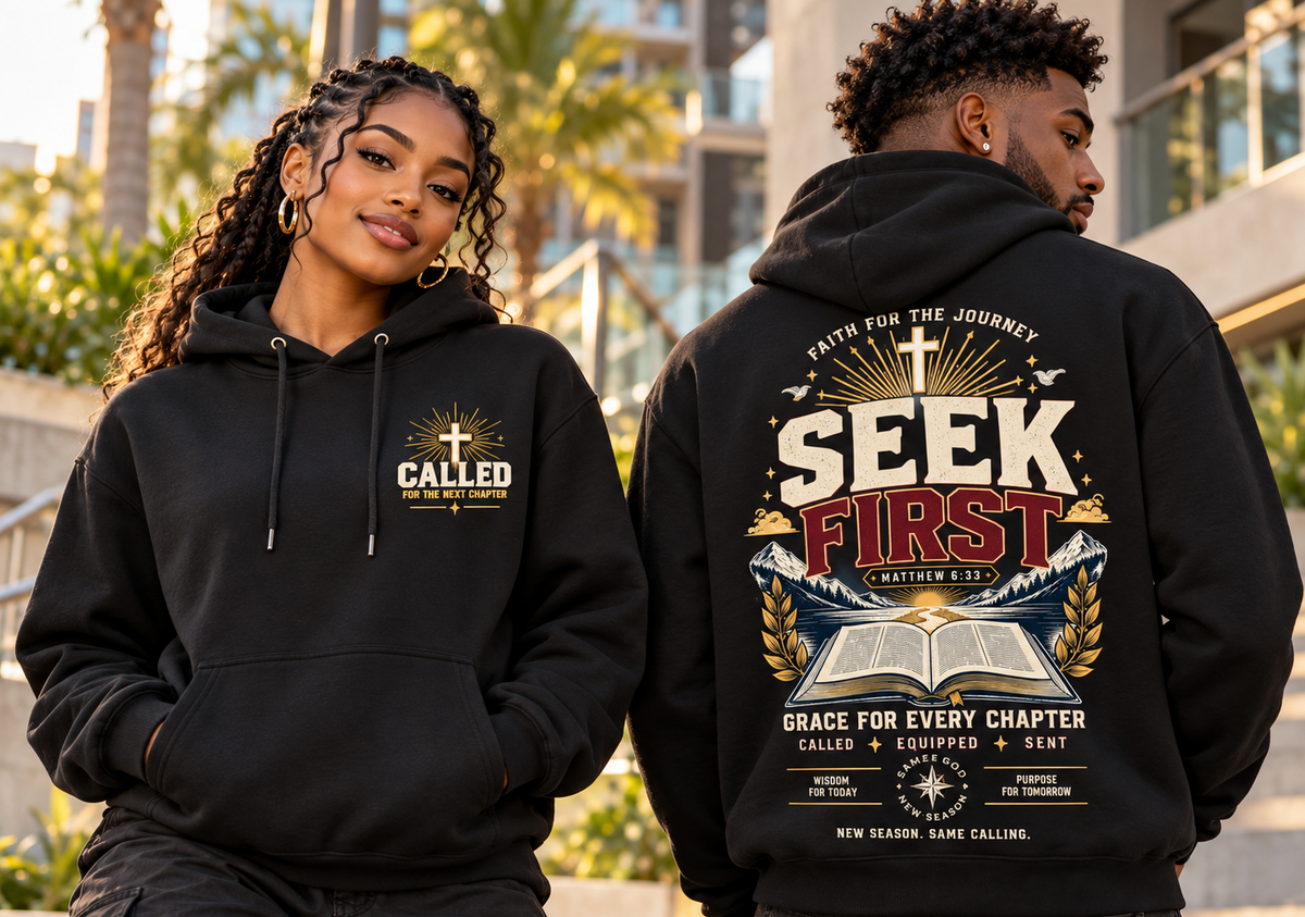 Two models wearing black hoodies in an outdoor urban setting. The model on the left shows the front of the hoodie, which has a gold and white graphic reading 'CALLED FOR THE NEXT Chapter'.